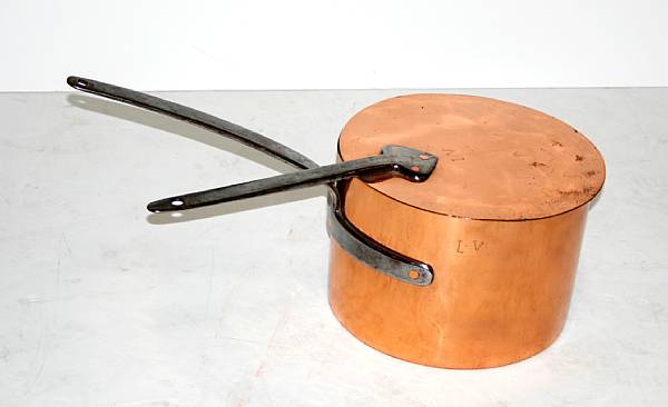 Appraisal: A European copper and steel saucepan with cover second half