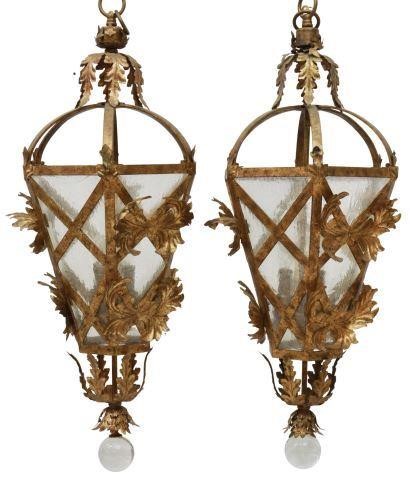 Appraisal: pair Wrought iron hanging lanterns in an antiqued gilt finish