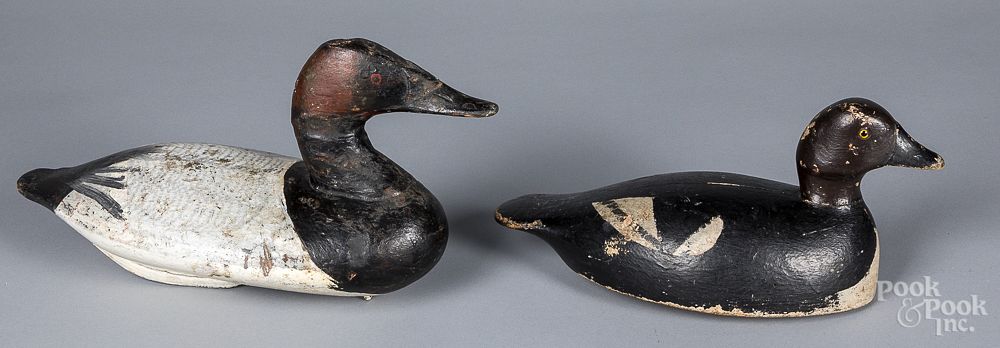 Appraisal: Two carved and painted duck decoys Two carved and painted