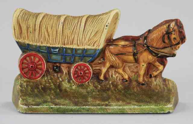 Appraisal: COVERED WAGON BOOKEND Hubley marked well scaled casting depicted with