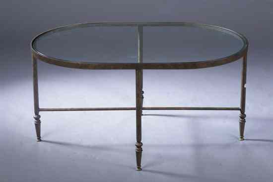 Appraisal: CONTEMPORARY DESIGNER PAINTED METAL OVAL COFFEE TABLE WITH GLASS TOP