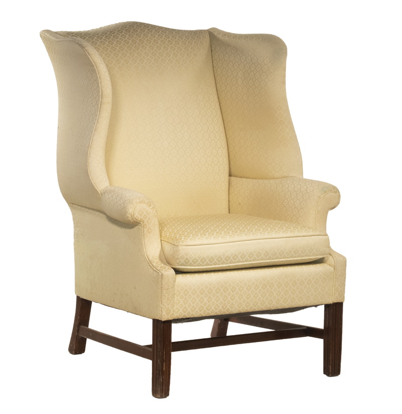 Appraisal: BUTTERY YELLOW UPHOLSTERED WING CHAIR Chippendale Mahogany Frame with ribbon