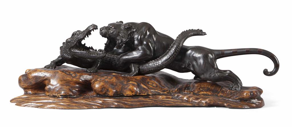 Appraisal: IMPRESSIVE JAPANESE BRONZE OKIMONO OF A TIGER ATTACKING A CROCODILE