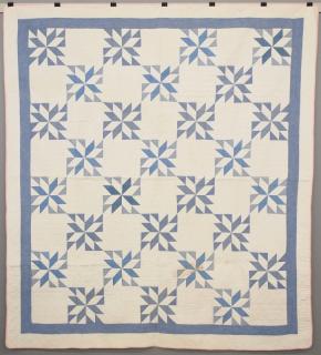 Appraisal: A late th-early th century pieced quilt Eight-point star variation