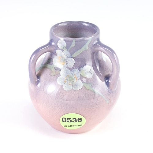 Appraisal: ROOKWOOD Iris glaze three-handled cabinet vase painted by Rose Fechheimer