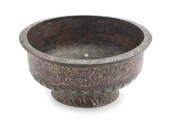 Appraisal: A Middle Eastern Footed Bronze Bowl of circular form with