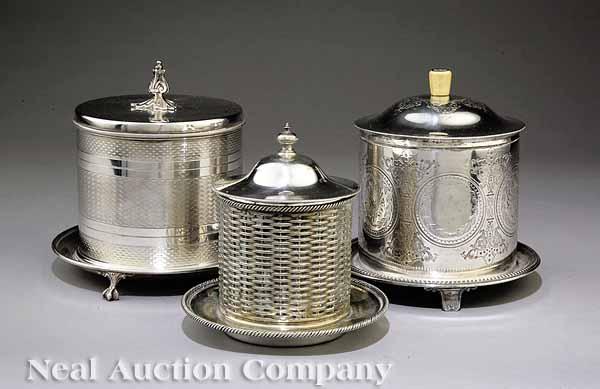 Appraisal: Three English Victorian Silverplate Biscuit Boxes including one round with