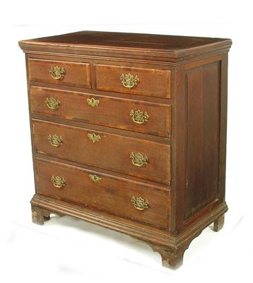 Appraisal: An th century oak chest having mahogany banded drawers fitted