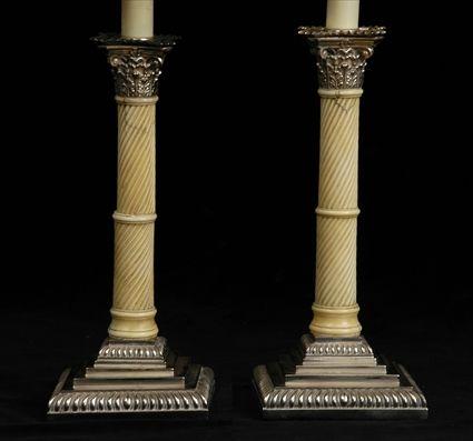 Appraisal: PAIR OF ENGLISH SILVER-PLATE MOUNTED IVORY COLUMN-FORM TABLE LAMPS Each