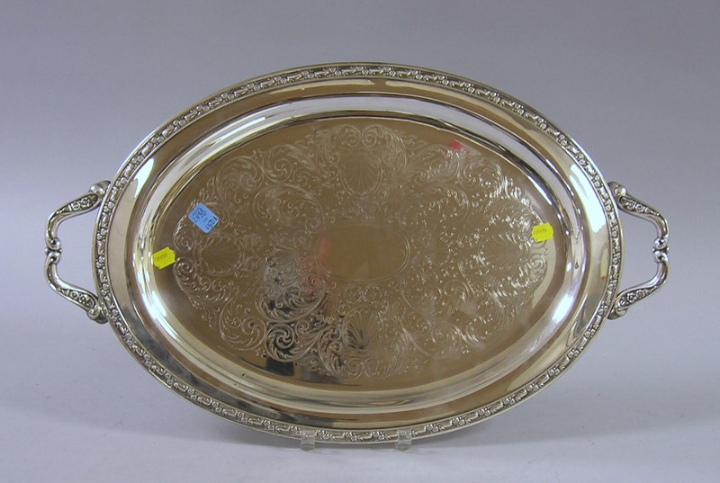 Appraisal: Oval Silver Plated Tray handled with decorative edge and shell