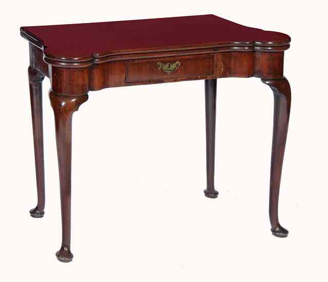 Appraisal: A GEORGE II RED WALNUT FOLD OVER TOP CARD TABLE