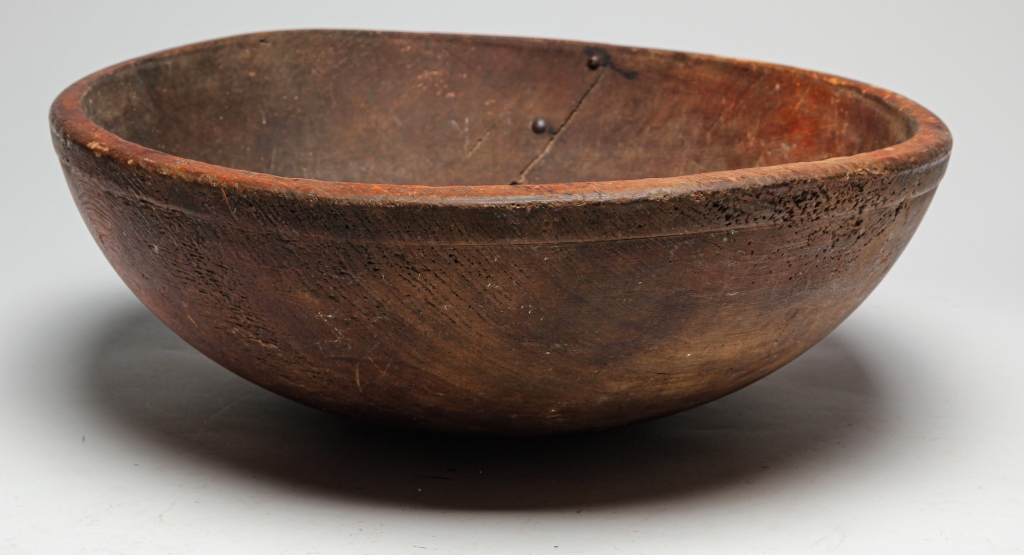 Appraisal: AMERICAN WOODEN TREENWARE BOWL Second half th century Good dark