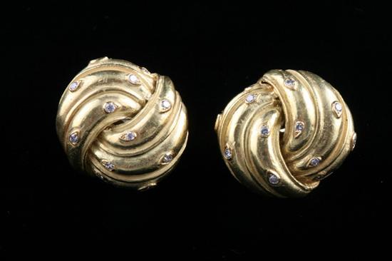 Appraisal: PAIR K YELLOW GOLD AND DIAMOND KNOT-FORM CLIP-BACK EARRINGS Each