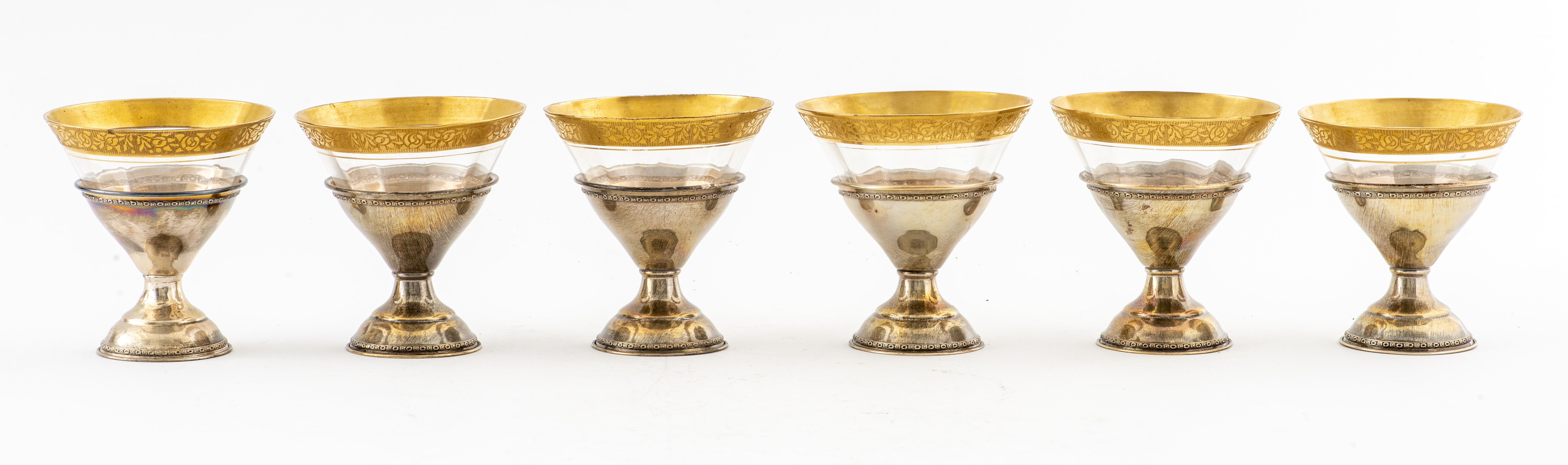 Appraisal: STERLING SILVER AND GILT GLASSES Set of six sterling silver