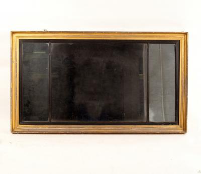 Appraisal: A gilded three-plate overmantel mirror with ebonised reeded borders cm