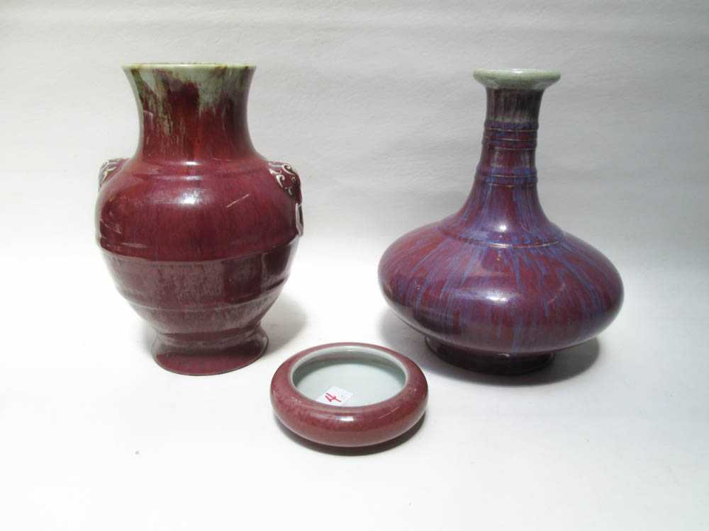 Appraisal: THREE CHINESE FLAMBE PORCELAIN VESSELS including a vase with raised