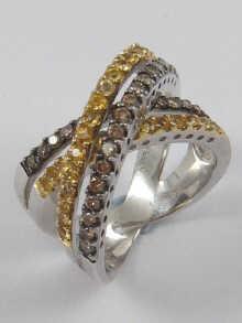 Appraisal: A white metal tests carat gold white and yellow diamond