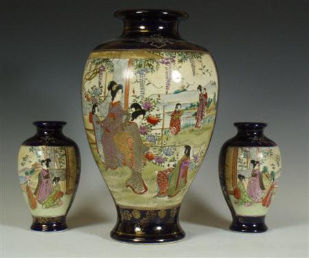 Appraisal: A Japanese satsuma matched vase garniture decorated with figures in