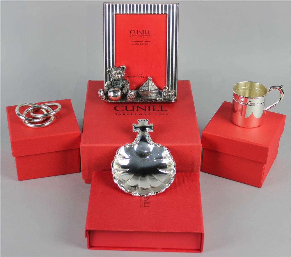 Appraisal: FOUR BOXED CUNILL SILVER BABY-THEMED ITEMS to include a silver