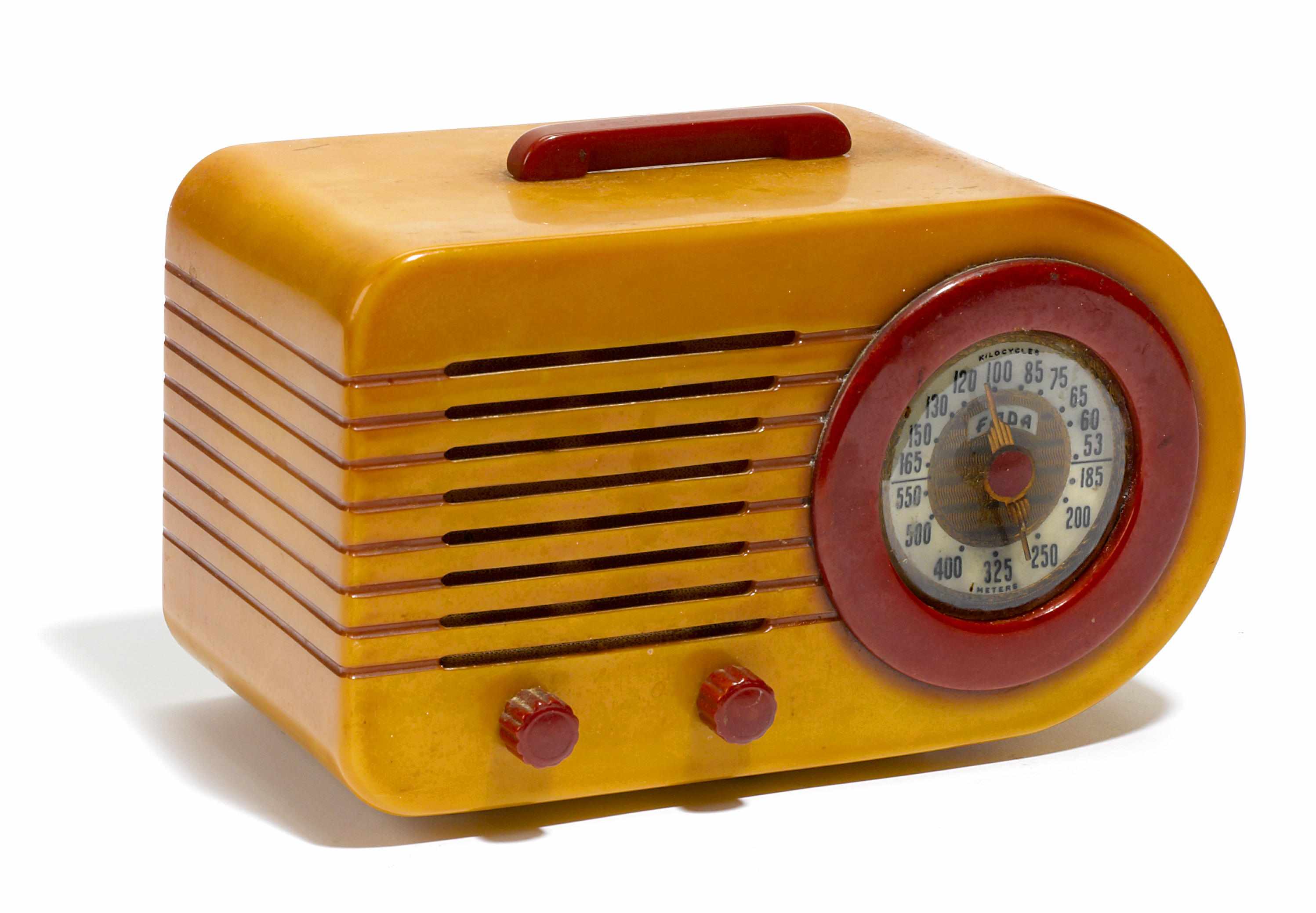 Appraisal: A FADA Streamliner Catalin radio the yellow case with red