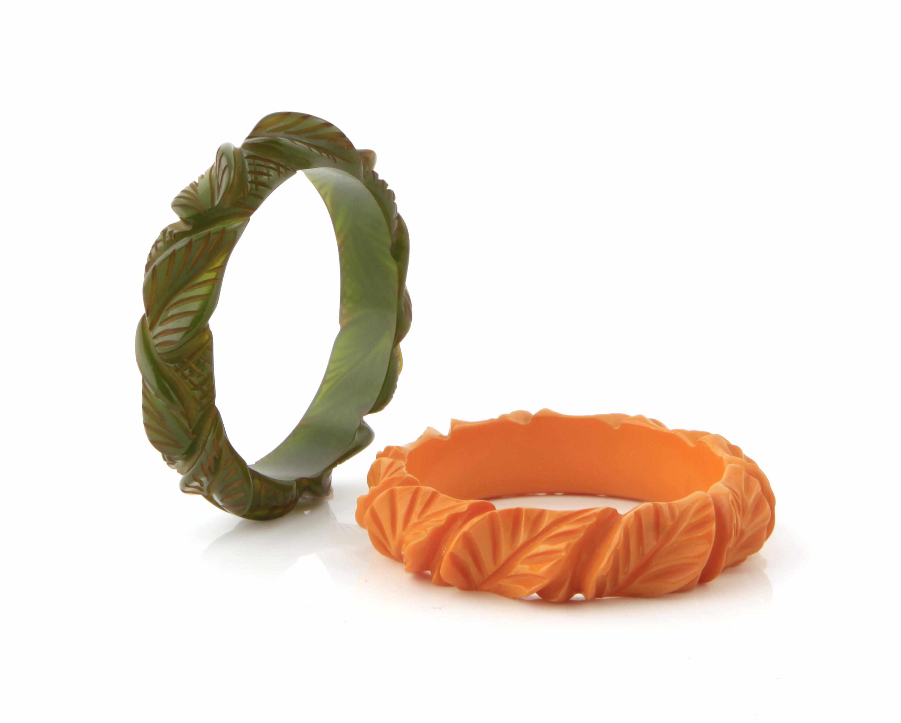 Appraisal: Two carved foliate Bakelite bangle bracelets each diameter in