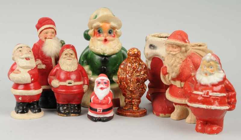 Appraisal: Lot of Assorted Santa Christmas Decorations Description Two are chalk