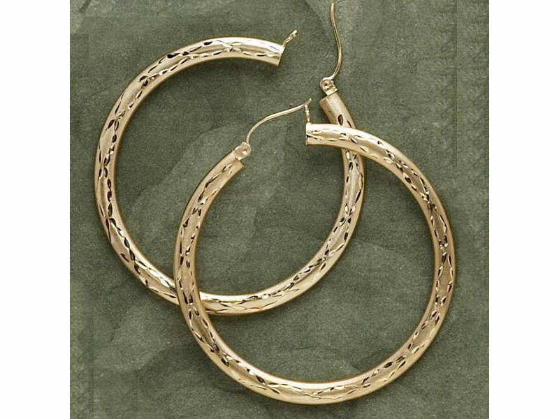 Appraisal: GOLD ENGRAVED EARRINGS k yellow gold engraved large hoop style