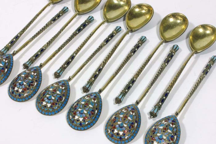 Appraisal: RUSSIAN SILVER GILT AND SHADED ENAMEL SPOONS matching set in