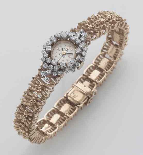 Appraisal: Retro ladies' Ebel K gold and diamond watchhaving a jewel