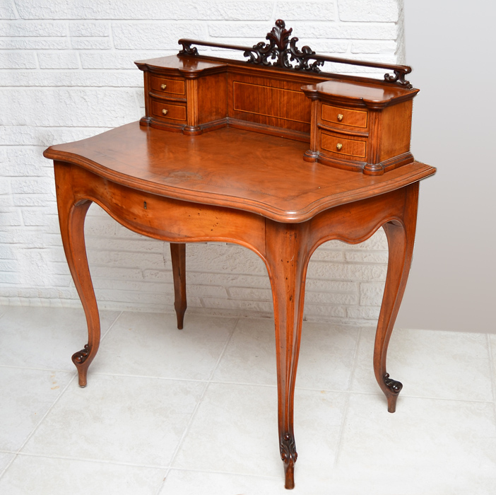 Appraisal: FRENCH VICTORIAN CARVED DESK Folitate carved gallery over small drawers