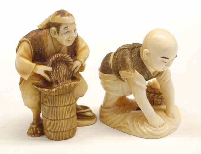 Appraisal: TWO IVORY CARVED NETSUKE bald-headed man with hands in water