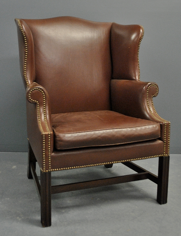 Appraisal: - Chippendale style mahogany red leather wing chair h x