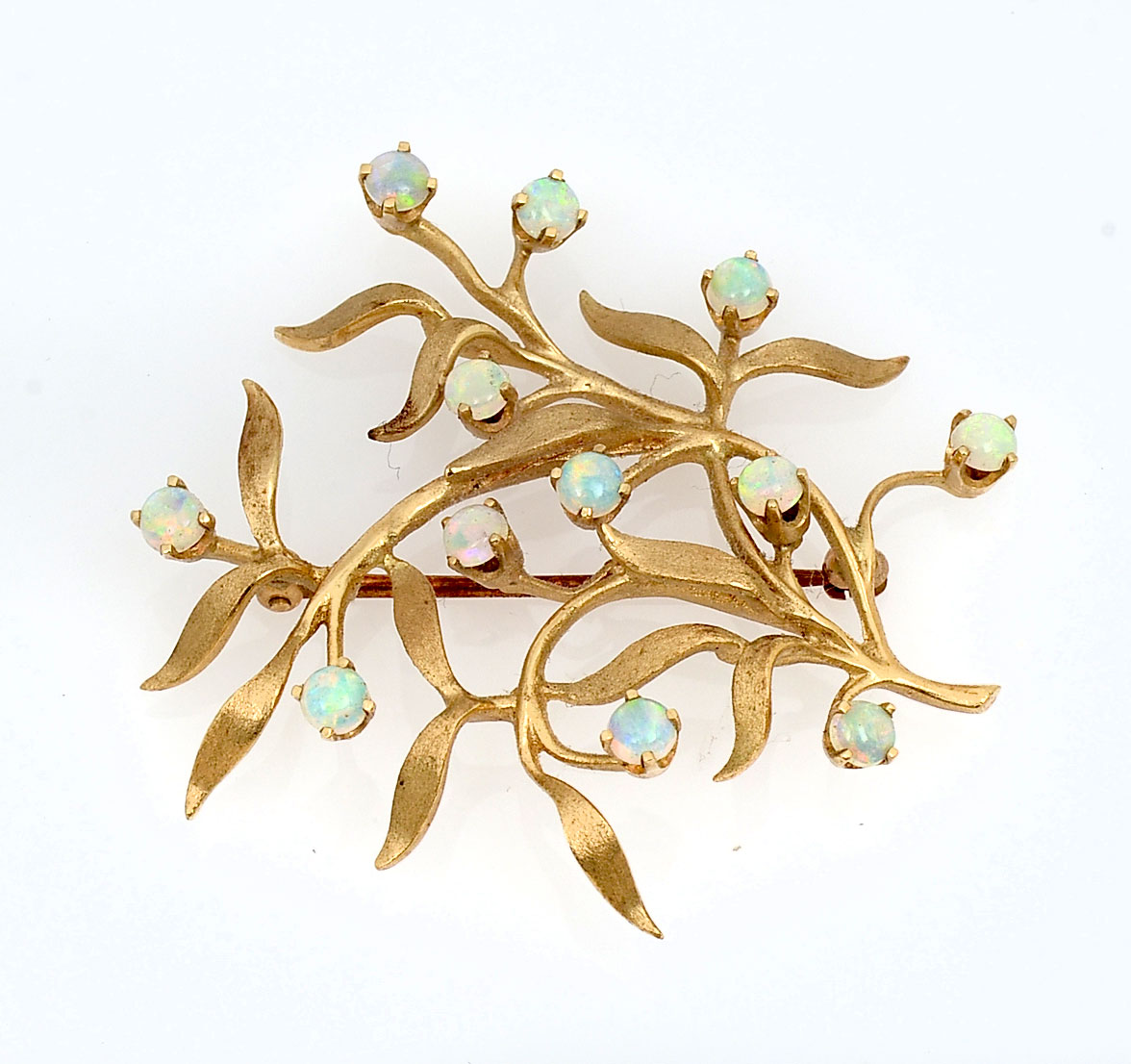 Appraisal: K OPAL BROOCH K yellow gold brooch contains round fiery