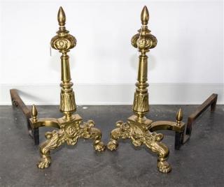 Appraisal: A Pair of Brass Andirons of baluster form with spike