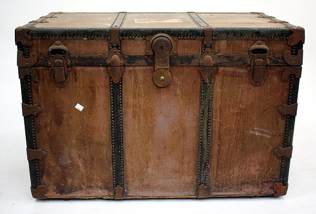 Appraisal: A LARGE OLD IRON BOUND SHIPPING TRUNK with Cunard label