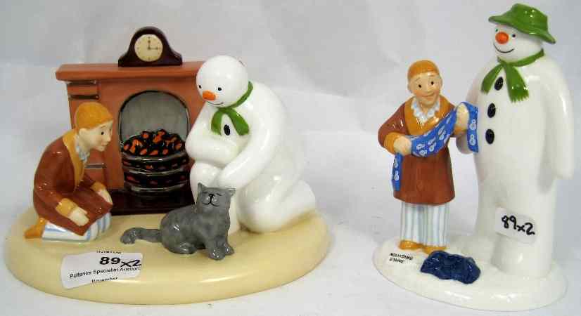 Appraisal: Coalport Snowman figures By the Fireside and The Gift boxed