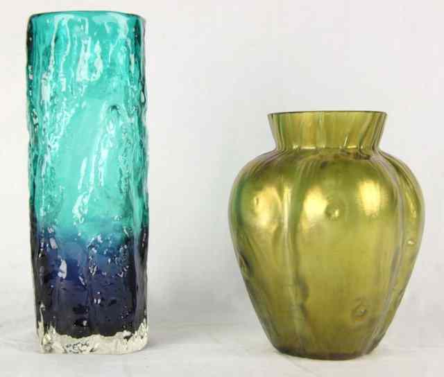 Appraisal: An iridescent green glass vase of four-lobed cross sections cm