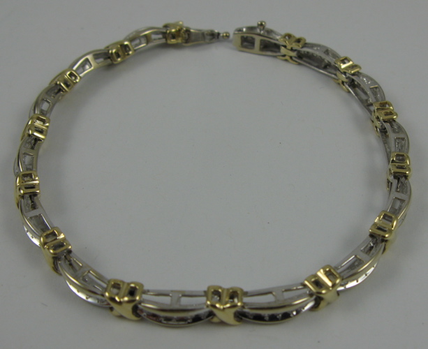 Appraisal: DIAMOND AND K YELLOW AND WHITE GOLD BRACELET - in