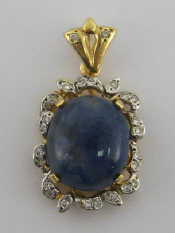 Appraisal: A yellow metal tests carat gold cabochon sapphire and diamond