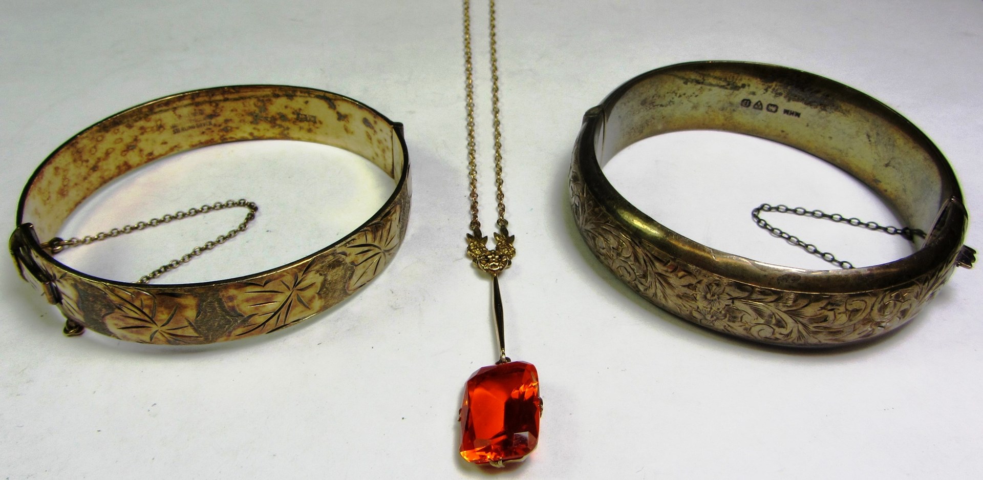 Appraisal: A gold and orange paste set pendant necklace cased a