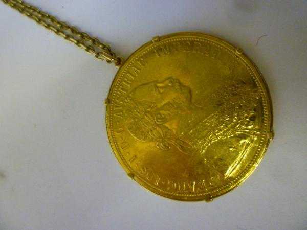 Appraisal: AN AUSTRO-HUNGARIAN FOUR DUCAT PIECE dated restrike loose mounted as