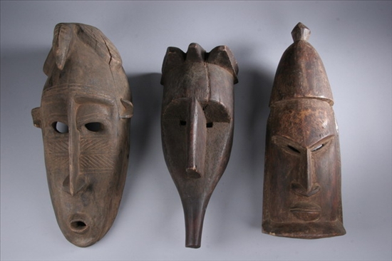 Appraisal: DOGON WOOD MASK AND TWO LOMA CARVED WOOD MASKS -