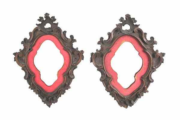 Appraisal: Pair of Victorian carved walnut mirrors late th c x