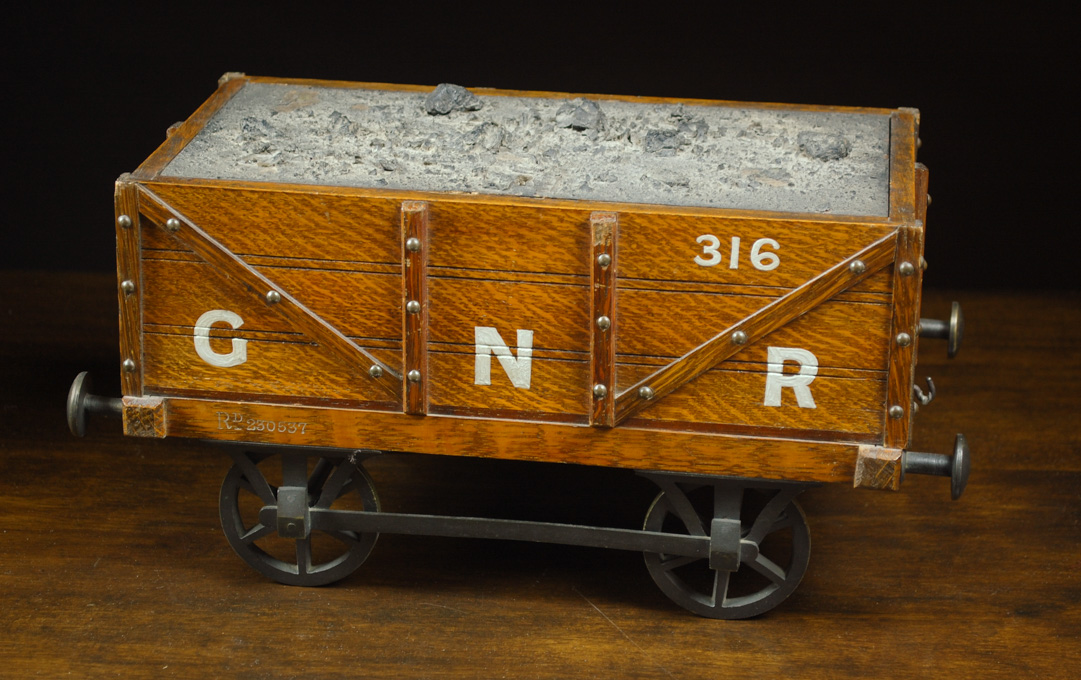 Appraisal: AN OAK COAL CAR HUMIDOR English registry no Rd c