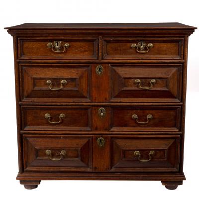 Appraisal: A th Century oak chest of two short over three