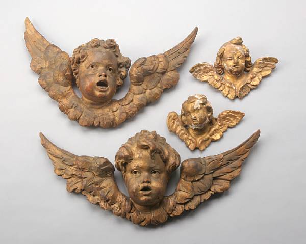 Appraisal: A group of four Continental giltwood amorini second half th