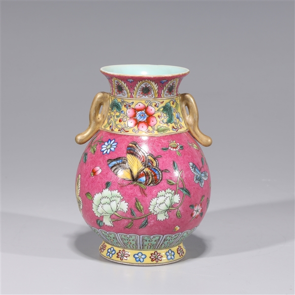 Appraisal: Chinese enameled porcelain jarlet with molded handles with butterfly and