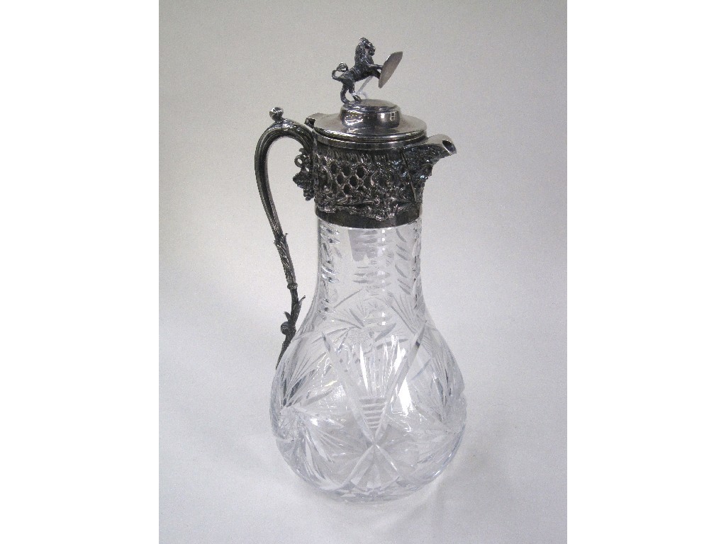 Appraisal: Silver plate mounted claret jug with lion finial