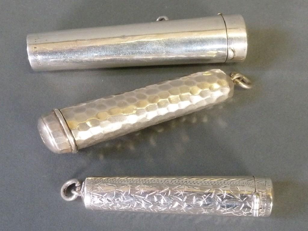 Appraisal: THREE EARLY TWENTIETH CENTURY SILVER CHEROOT HOLDER CASES EST -