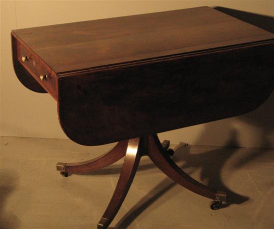 Appraisal: th century mahogany centre pillar Pembroke table with two drawers